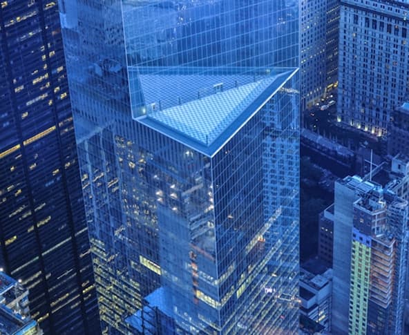 Prédio azul de vidro.